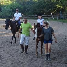 Walking a kid on the riding property